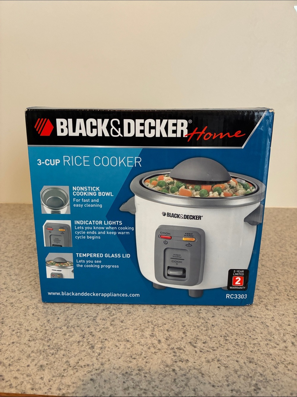 New in box, never used. Black & Decker 3-cup Rice Cooker
